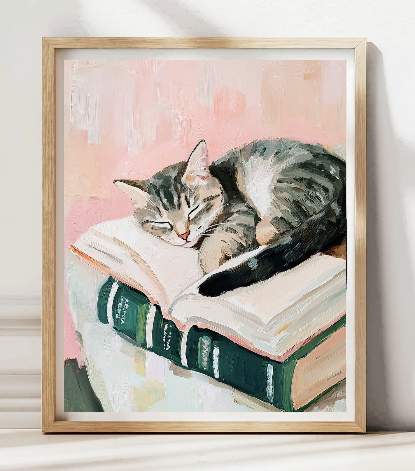 cute tabby cat sleeping on book pile poster